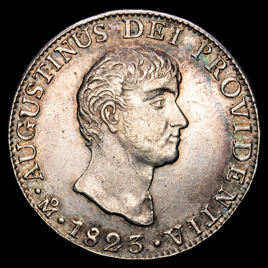 México – Augustinus. 8 Reales. (27,07 g.). México. 1823. Ensayador J·M. KM-310. EBC. Restos de brillo original. Tono y bello color.